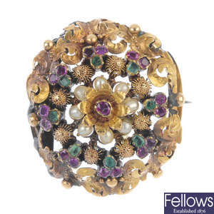 A mid 19th century gold gem-set brooch.