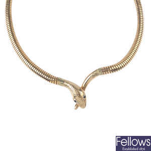 A mid 20th century 9ct gold snake necklace.