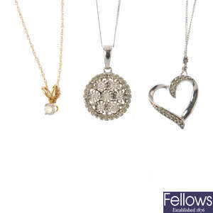 Three diamond pendants, with chain.
