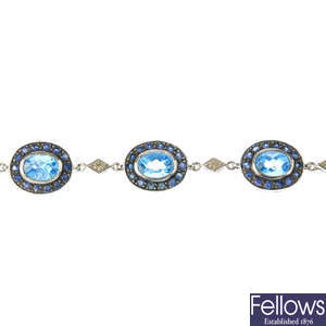 A 9ct gold topaz and sapphire bracelet.
