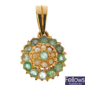 An 18ct gold emerald ring and pendant.
