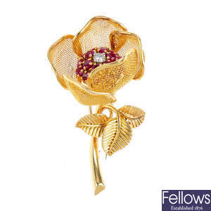 A mid 20th century 18ct gold diamond and ruby rose brooch.