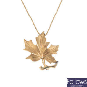 A leaf brooch and chain.