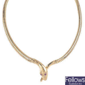 A 9ct gold snake necklace.