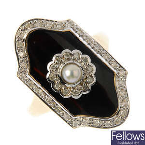 A split pearl, onyx and diamond dress ring.