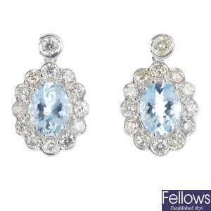A pair of 18ct gold aquamarine and diamond floral cluster earrings.