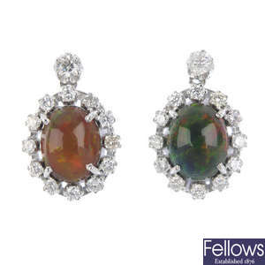 A pair of 18ct gold opal and diamond cluster earrings.