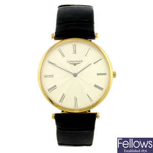 LONGINES - a mid-size gold plated La Grande Classique wrist watch.