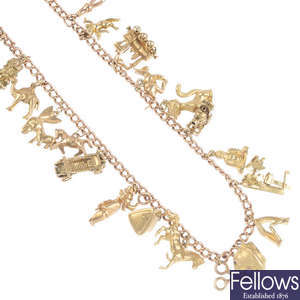 A 9ct gold charm necklace.