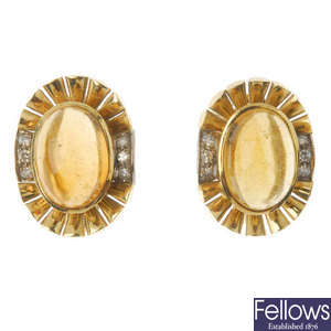 A pair of amber and diamond earrings.