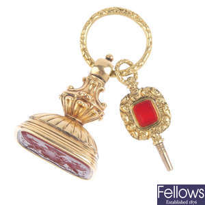 A Regency gold carnelian fob for the Earl of Guildford and a watch key.