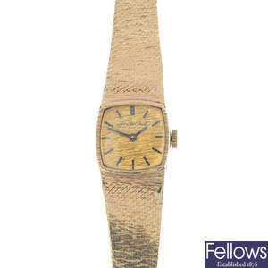 BUECHE GIROD - a lady's mid 20th century 9ct gold wristwatch.