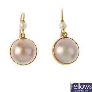 A pair of mabe pearl and cultured pearl earrings.