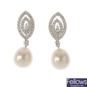 A pair of South Sea cultured pearl and diamond earrings.