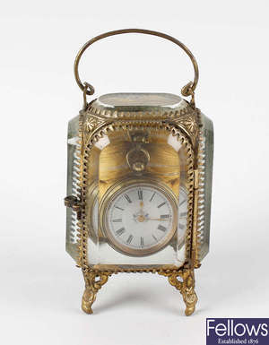 A Victorian brass fob watch case.