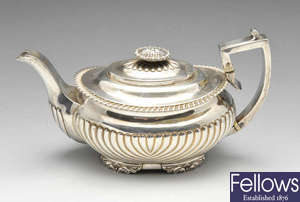 A George III silver teapot. 