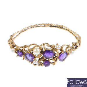 A 1970s 9ct gold amethyst and pearl bangle.