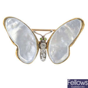 A late Victorian gold, diamond and gem-set butterfly brooch.