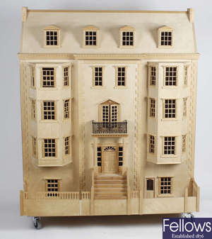 A large and detailed modern doll's house.