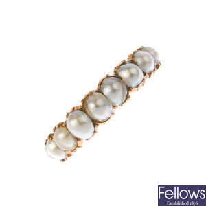 A split pearl ring.