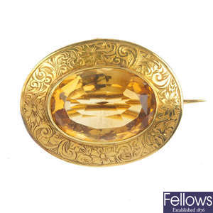 A late Victorian gold citrine brooch, circa 1880.