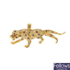 An 18ct gold diamond, sapphire and ruby leopard pendant.