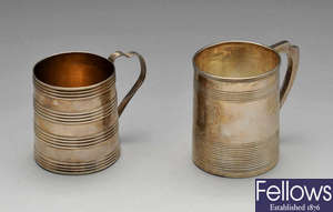 Two George III silver christening mugs.