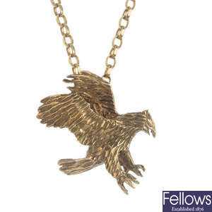 A 9ct gold eagle pendant, with chain.