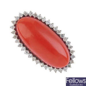A coral and diamond cluster ring.