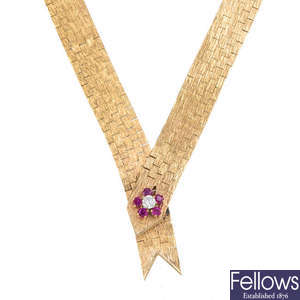 A 1960s 9ct gold diamond and ruby cluster necklace.