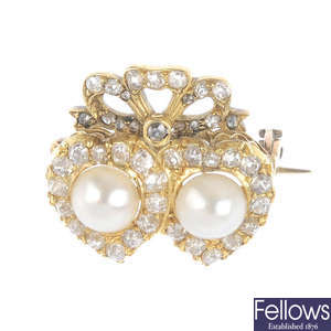 An early 20th century gold, diamond and cultured pearl brooch.