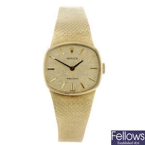ROLEX - a lady's yellow metal Precision bracelet watch.