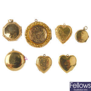 Seven gold back and front lockets.