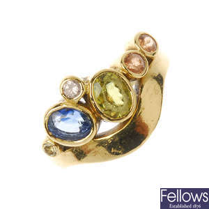 An 18ct gold gem-set ring.