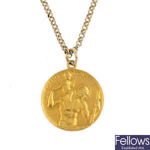 A 9ct gold St. Christopher pendant.