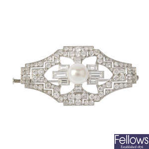 A cultured pearl and diamond brooch. 