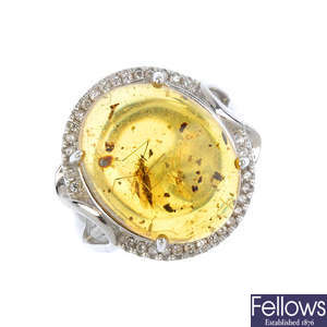 A natural Burmese amber ring with bug inclusion.