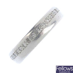 A platinum and diamond band ring.