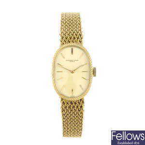 AUDEMARS PIGUET - a lady's 18ct yellow gold bracelet watch.