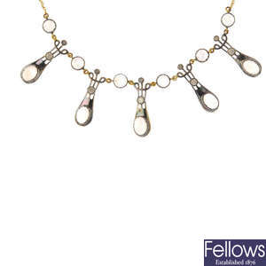 A diamond and moonstone necklace.