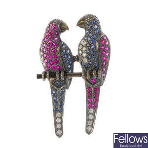 A novelty ruby, sapphire and diamond brooch.