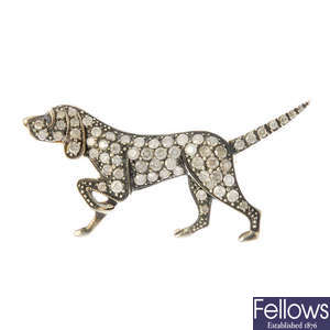 A novelty dog diamond brooch.