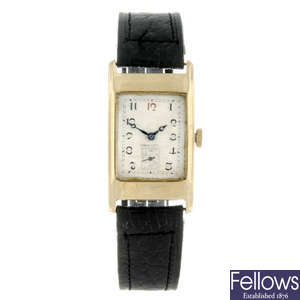 LONGINES - a gentleman's 9ct yellow gold wrist watch.