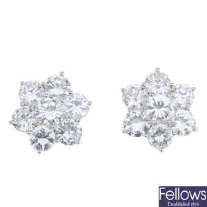 A pair of diamond floral cluster ear studs.