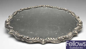 A continental silver mounted wall mirror.