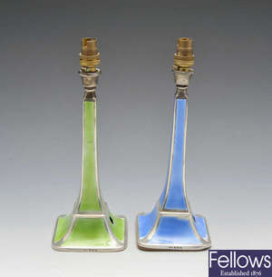 A pair of 1930's silver and enamel electric lamp bases.