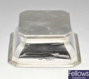 An Edwardian silver mounted inkwell.