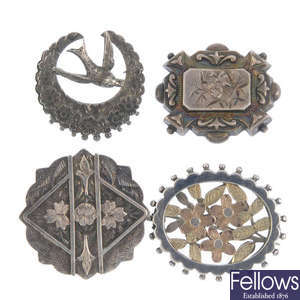 A selection of mainly late 19th to early 20th century silver brooches.