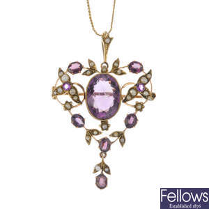 An early 20th century gold amethyst, garnet-topped-doublet and seed pearl pendant.