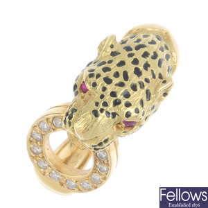 An 18ct gold diamond and enamel leopard ring.